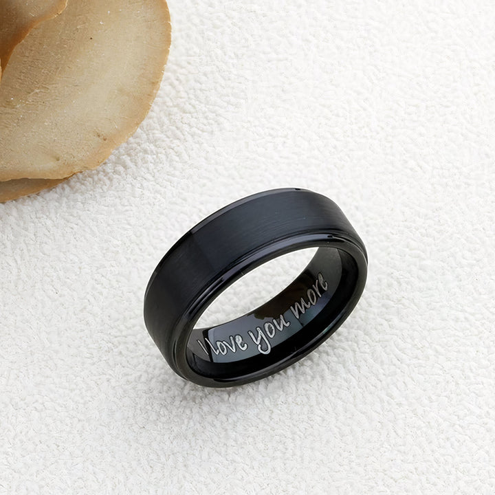 Personalized Black promise ring, featuring a custom engraving, I love you more symbolizing commitment and love