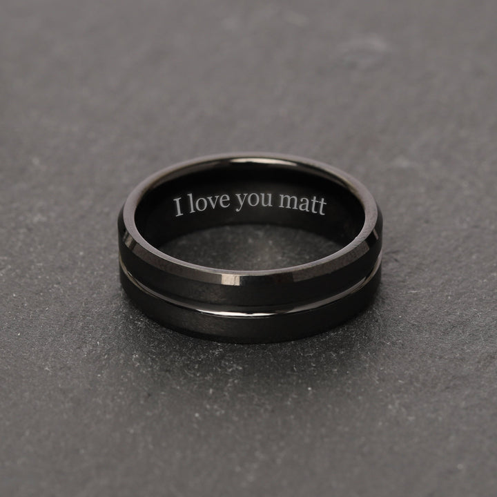 Sleek Personalized Black Wedding Band for Men, perfect as an elegant promise ring with a distinctive central groove