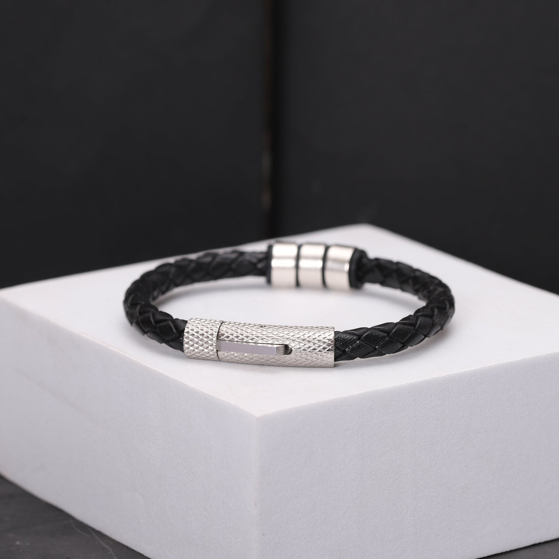 Elegant leather bracelet with names meticulously engraved, offering a unique and meaningful accessory for everyday wear.