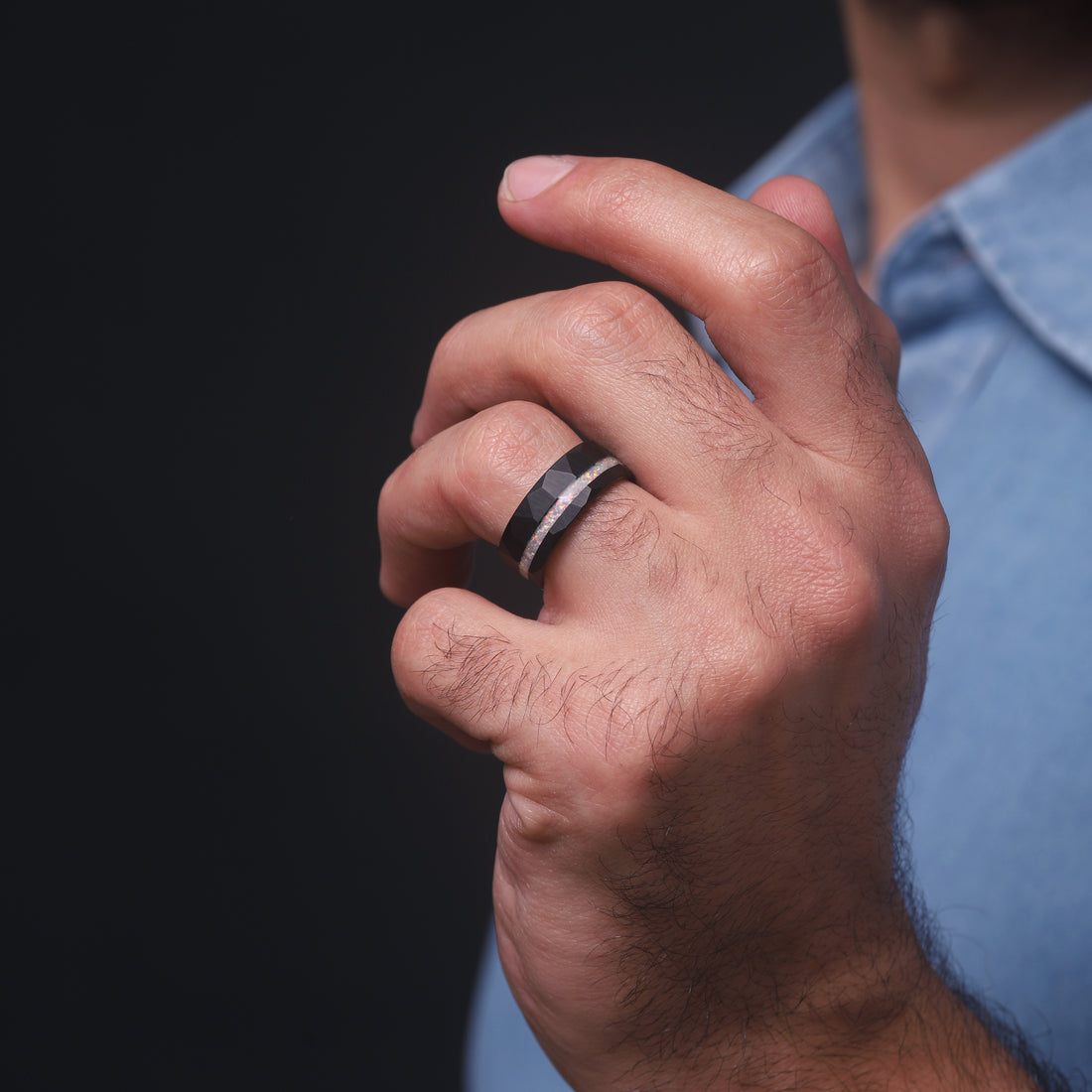 Close-up of a custom-engraved white opal inlay ring for men, perfect for weddings or anniversaries.